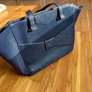Elegant leather blue bag with big bow detail